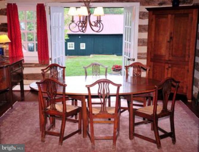 3032 Bull Run Mountain Road The Plains, VA 20198 - Photo 6 of 16 a table and chairs in a room
