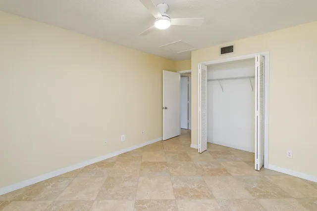 an empty room with a bathroom