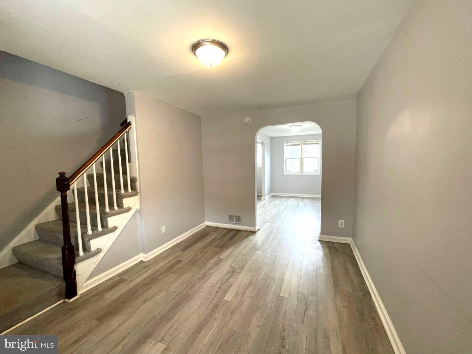 4103 Colborne Road Baltimore, MD 21229 - Photo 5 of 28 Living Room with Archway to Dining Room