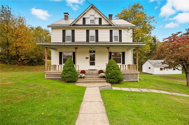 a view of a balcony with wooden floor