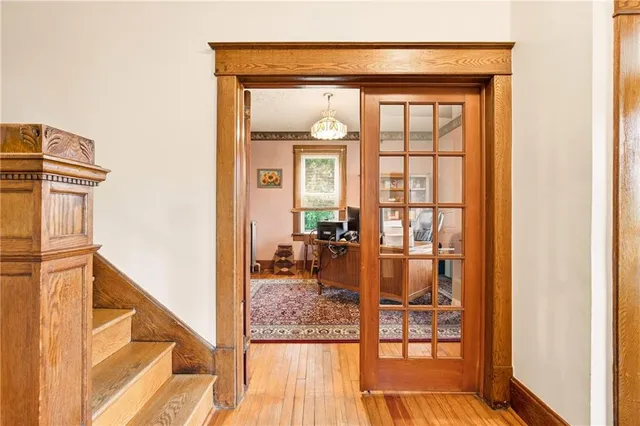 a view of a livingroom with furniture and a flat screen tv
