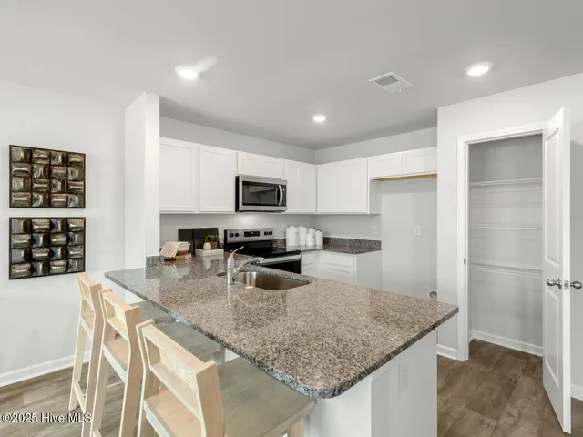 $396,990 | 142 North Grassland Road, Unit 4, Surf City, NC 28445