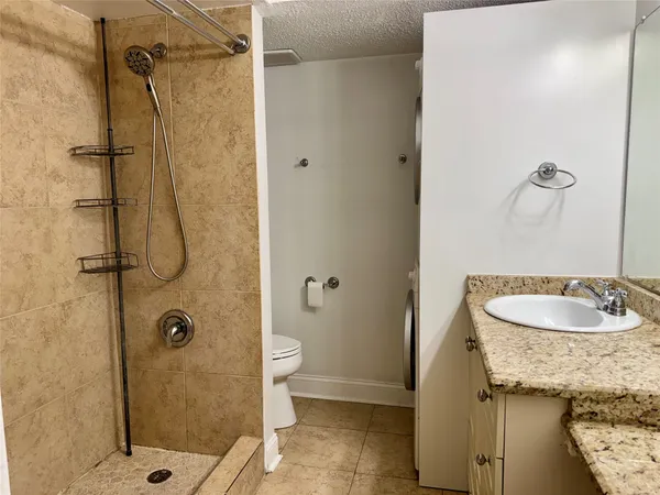 a view of a balcony with wooden floor