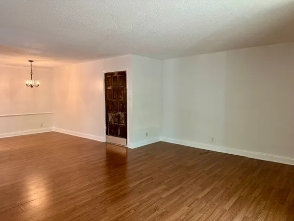 a view of swimming pool with an outdoor seating