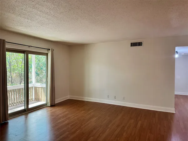 a white refrigerator freezer sitting inside of a kitchen