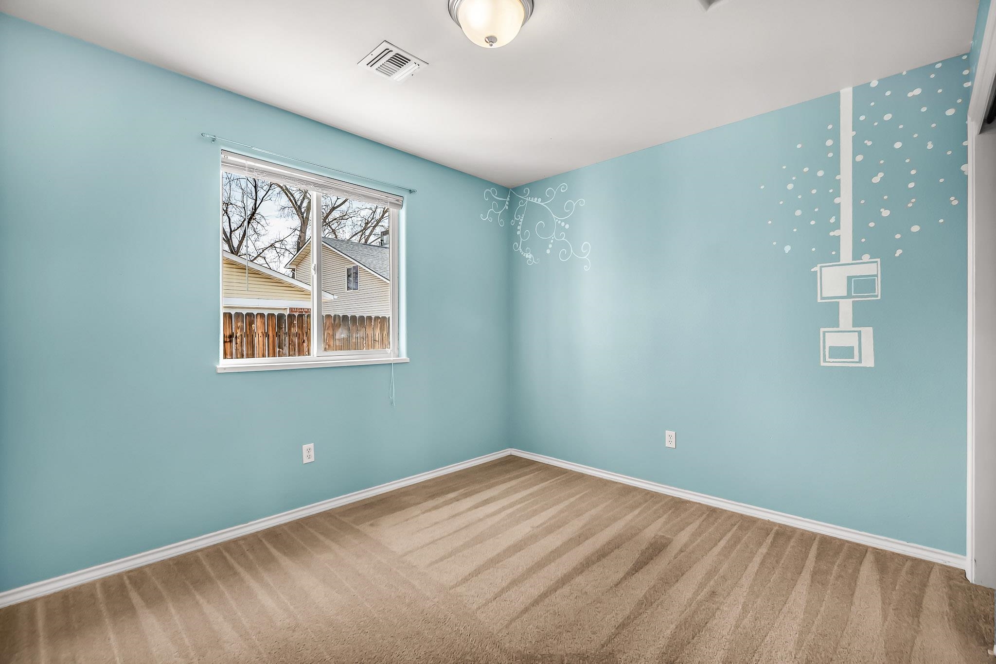 476 Ridge Lane Grand Junction, CO 81504 - Photo 12 of 22 a view of an empty room with a window