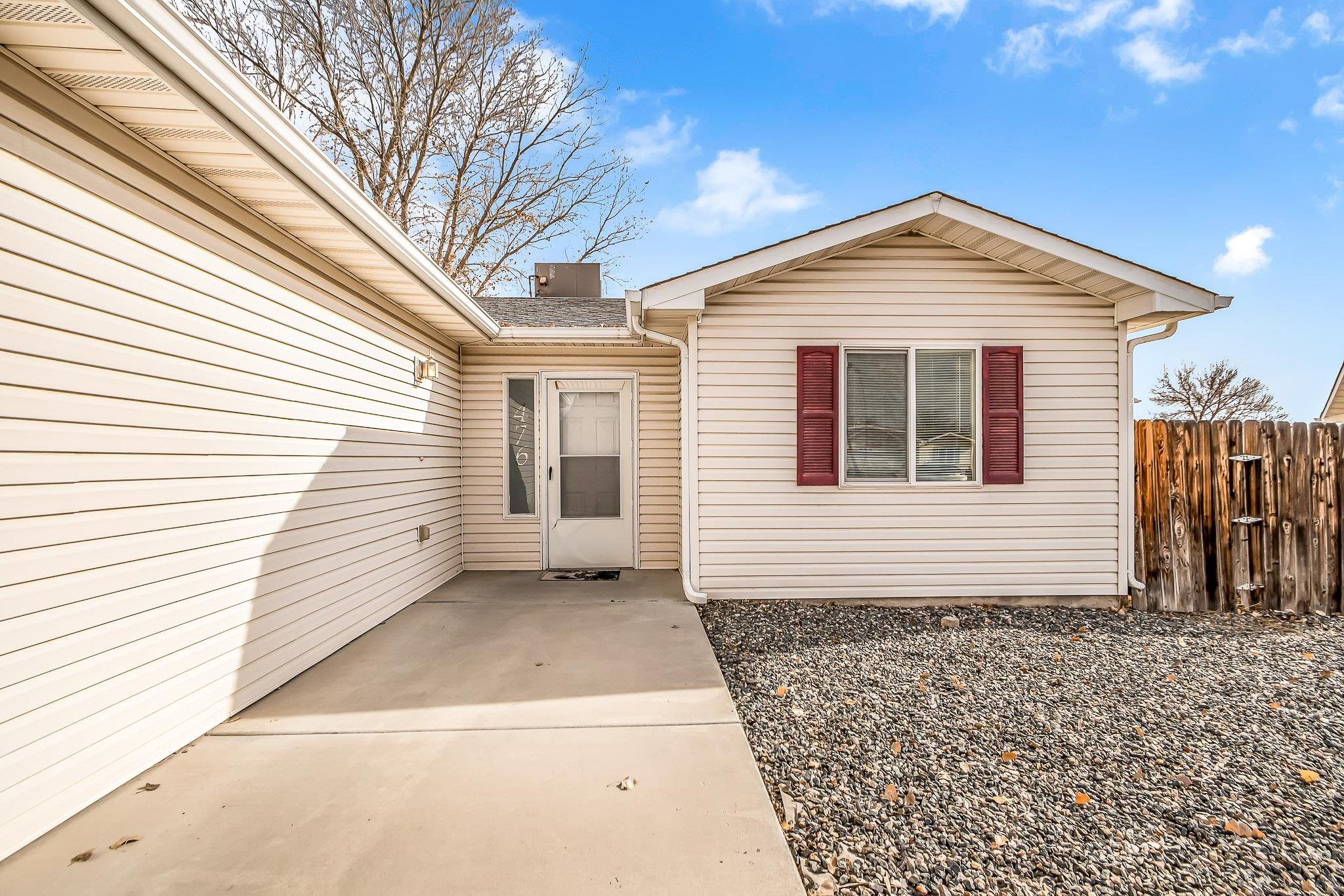 476 Ridge Lane Grand Junction, CO 81504 - Photo 17 of 22 a front view of a house with a yard