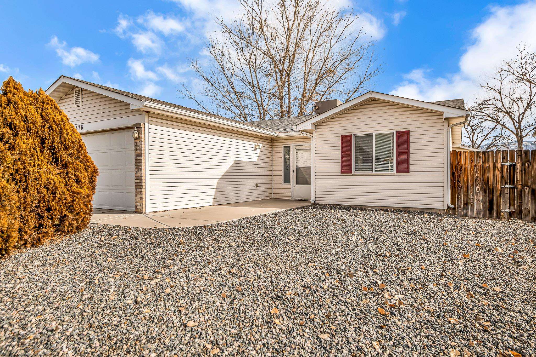 476 Ridge Lane Grand Junction, CO 81504 - Photo 19 of 22 a view of a house with a yard