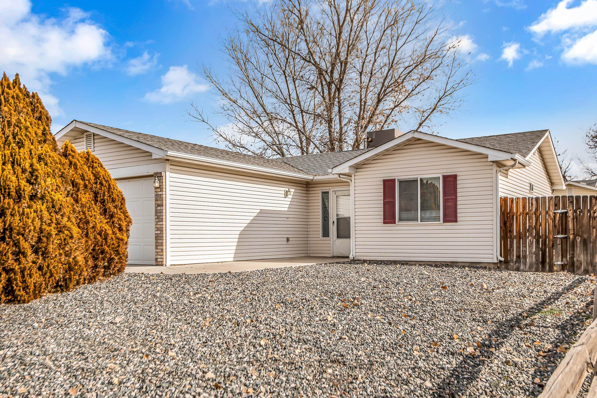 476 Ridge Lane Grand Junction, CO 81504 - Photo 20 of 22 a front view of a house with a yard