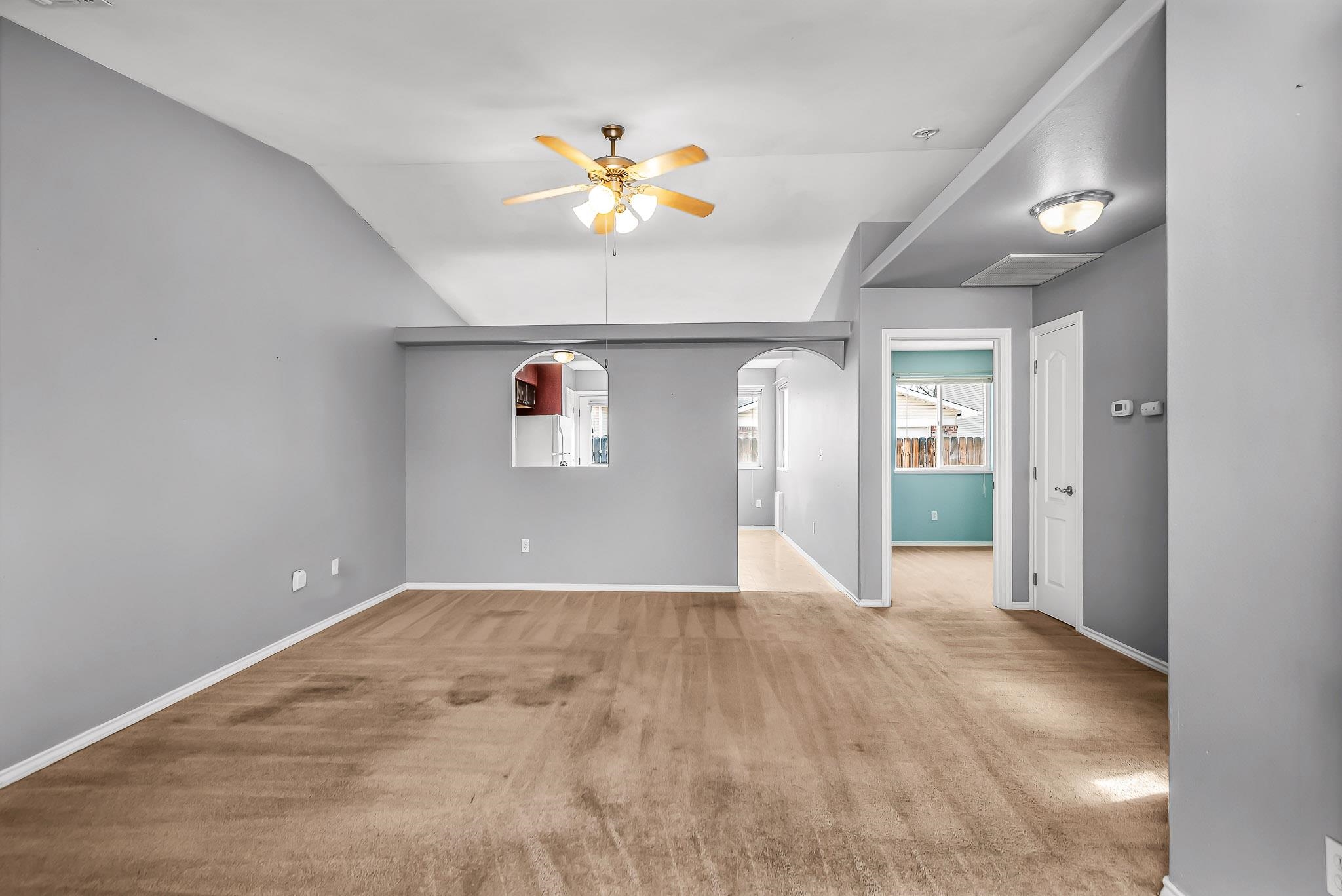 476 Ridge Lane Grand Junction, CO 81504 - Photo 3 of 22 a view of an empty room with a window
