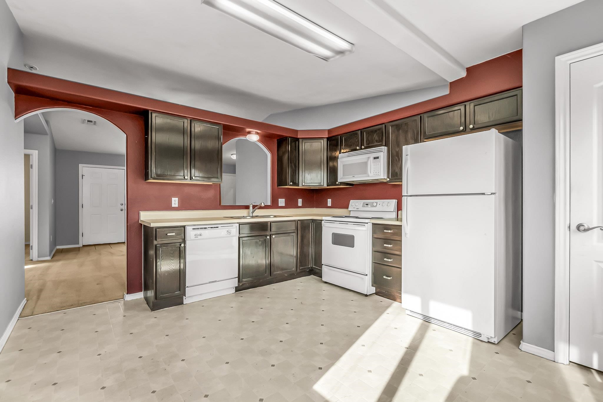 476 Ridge Lane Grand Junction, CO 81504 - Photo 4 of 22 a kitchen with stainless steel appliances a refrigerator sink and stove