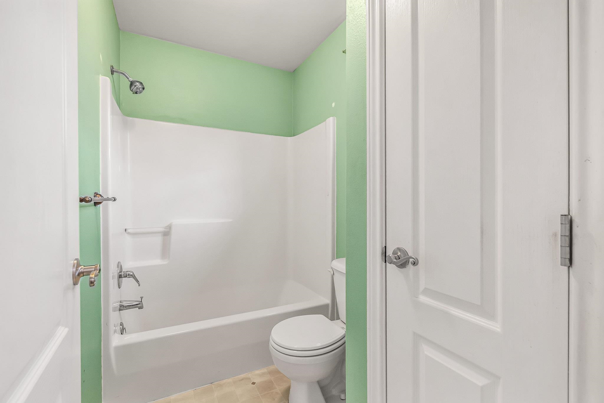 476 Ridge Lane Grand Junction, CO 81504 - Photo 10 of 22 a bathroom with a toilet and a shower