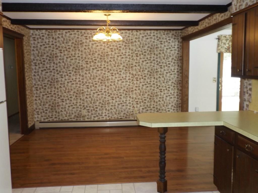 234 Kidder Hill Road Holden, ME 04429 - Photo 8 of 35 View from kitchen to eat-in area.