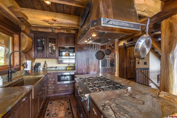 a view of a table and chairs in the patio