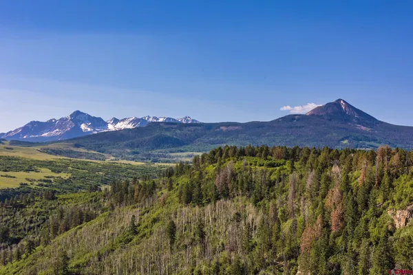 a view of an outdoor space with mountain view