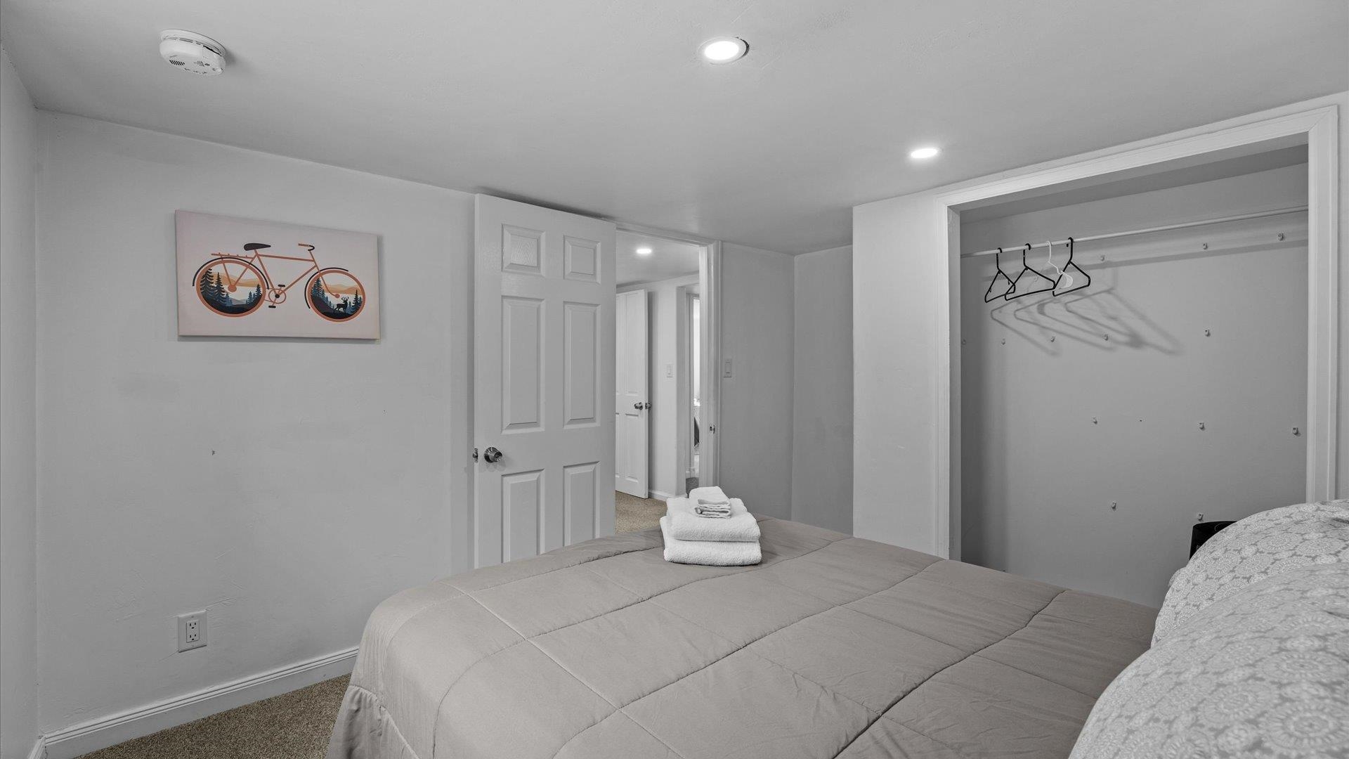 829 East Aspen Avenue Fruita, CO 81521 - Photo 17 of 27 a bedroom with a bed and a window