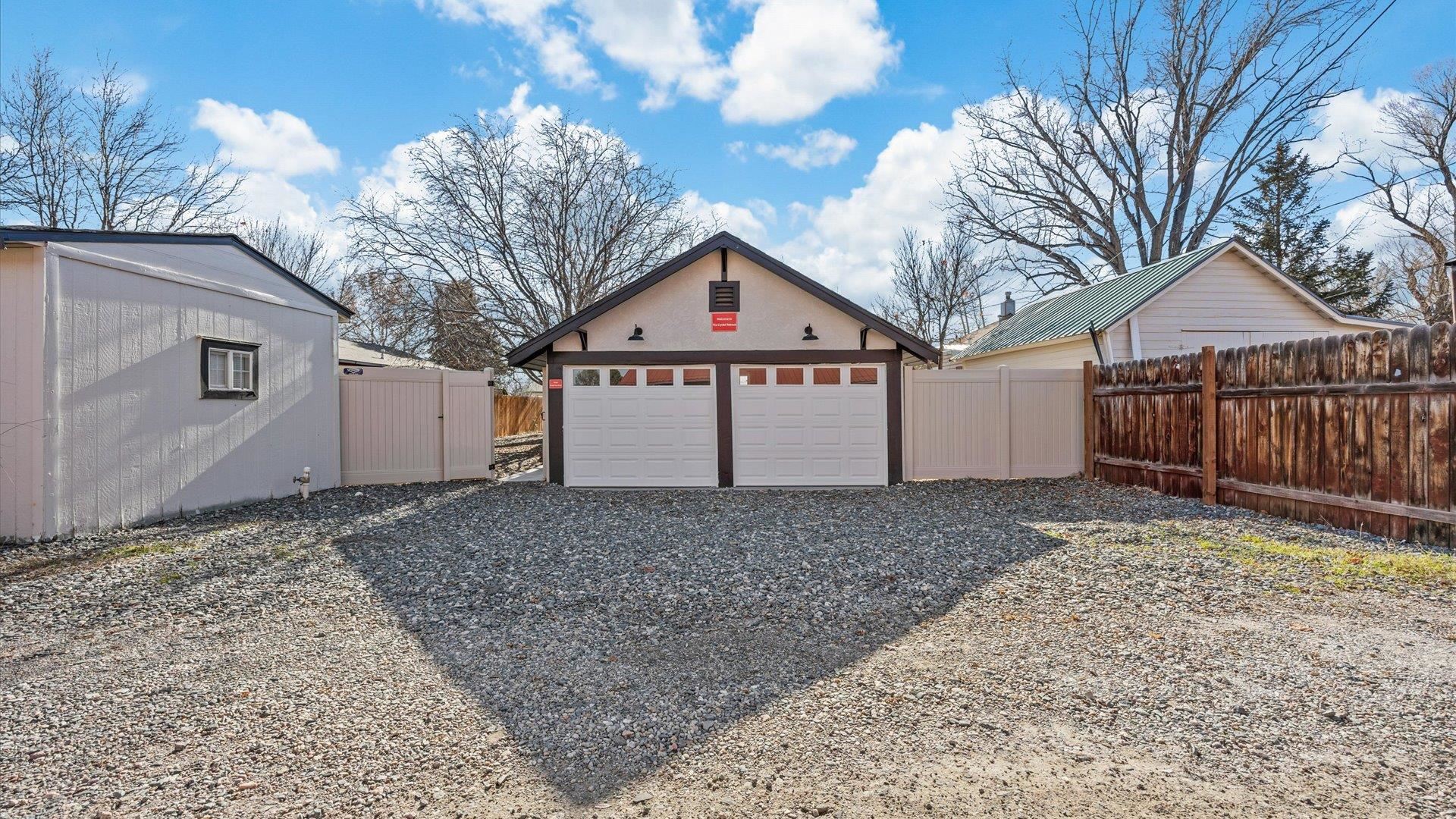 829 East Aspen Avenue Fruita, CO 81521 - Photo 26 of 27 a house with a large tree in front of it
