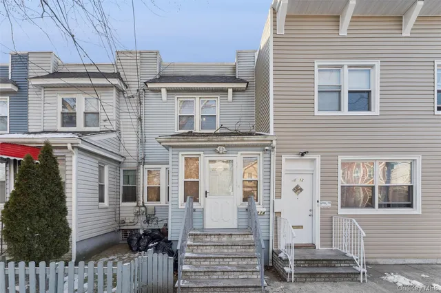 a front view of a house with a door