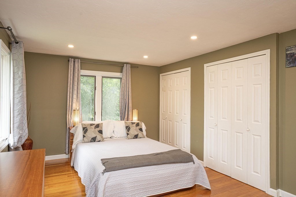 25 Sandy Ridge Road Stoughton, MA 02072 - Photo 18 of 42 a bedroom with a bed and a window