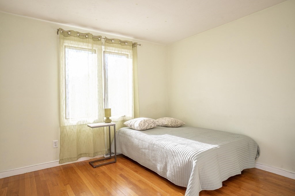 25 Sandy Ridge Road Stoughton, MA 02072 - Photo 25 of 42 a bedroom with a bed and a window