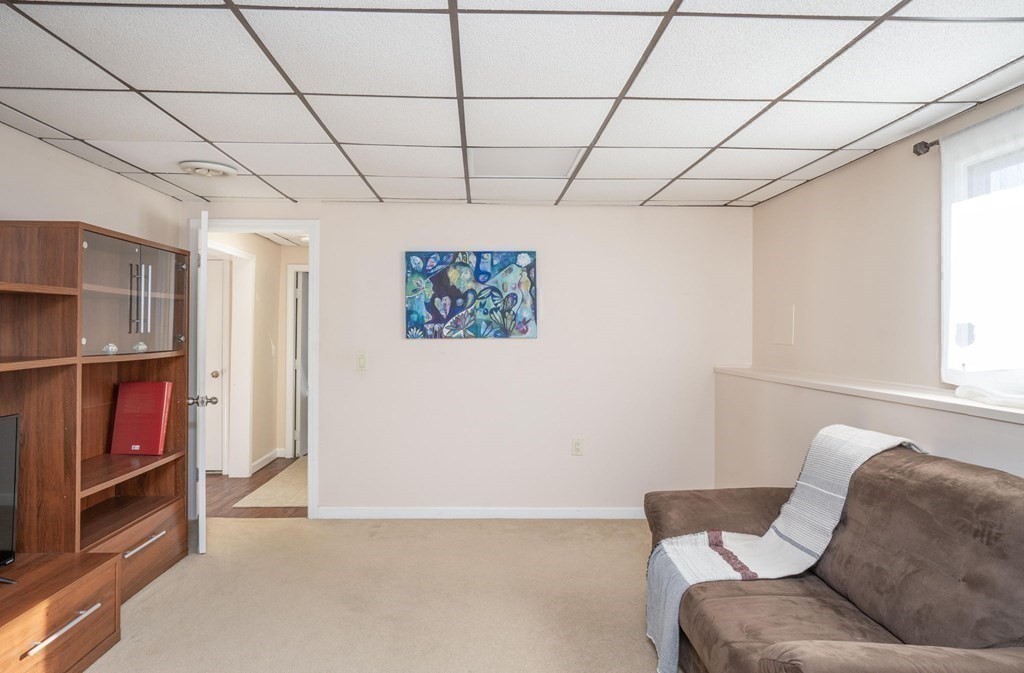 25 Sandy Ridge Road Stoughton, MA 02072 - Photo 30 of 42 a living room with furniture