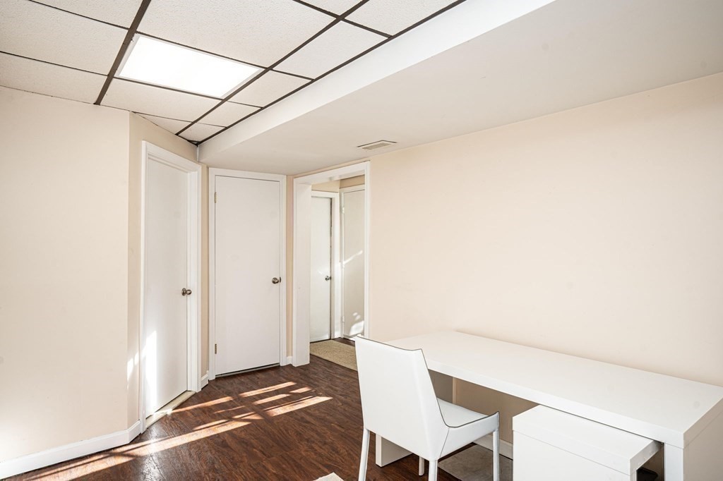 25 Sandy Ridge Road Stoughton, MA 02072 - Photo 33 of 42 a view of a room with furniture and wooden floor