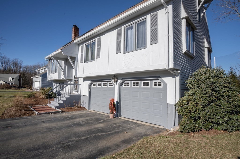 25 Sandy Ridge Road Stoughton, MA 02072 - Photo 35 of 42 a view of a street with buildings