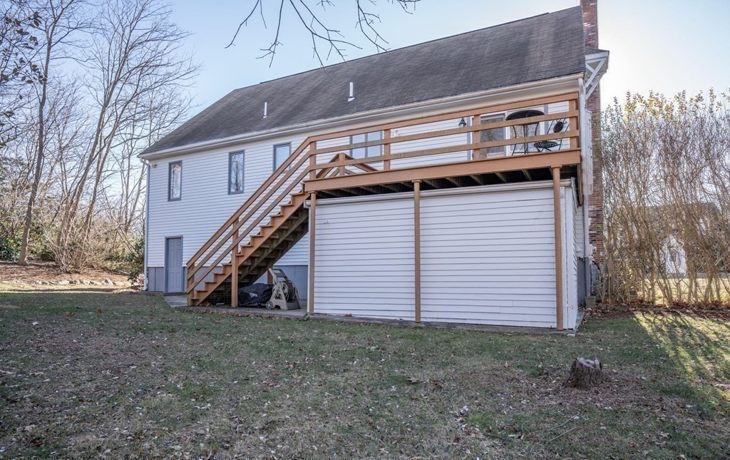 25 Sandy Ridge Road Stoughton, MA 02072 - Photo 38 of 42 a view of a house with a yard