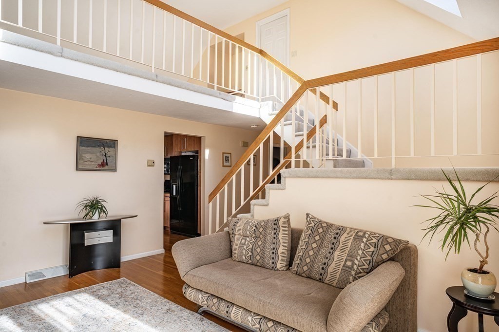 25 Sandy Ridge Road Stoughton, MA 02072 - Photo 6 of 42 a living room with furniture and a potted plant