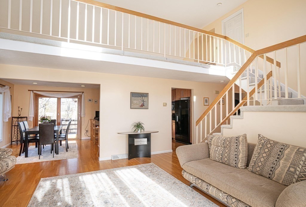 25 Sandy Ridge Road Stoughton, MA 02072 - Photo 8 of 42 a living room with furniture