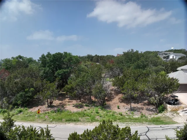 an aerial view of residential house with outdoor space
