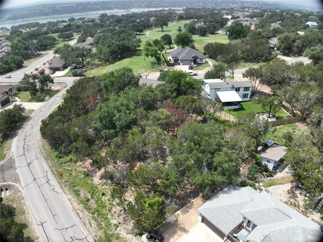 an aerial view of residential house with outdoor space