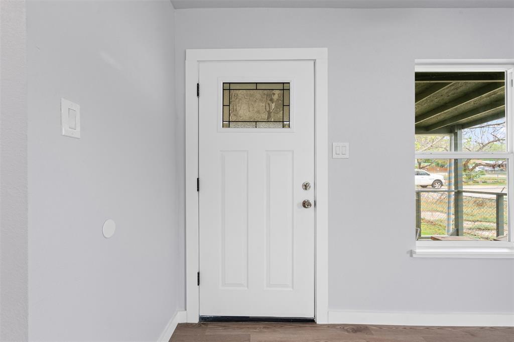 1205 Southwest 12th Street Mineral Wells, TX 76067 - Photo 8 of 23 a view of an entryway with a window