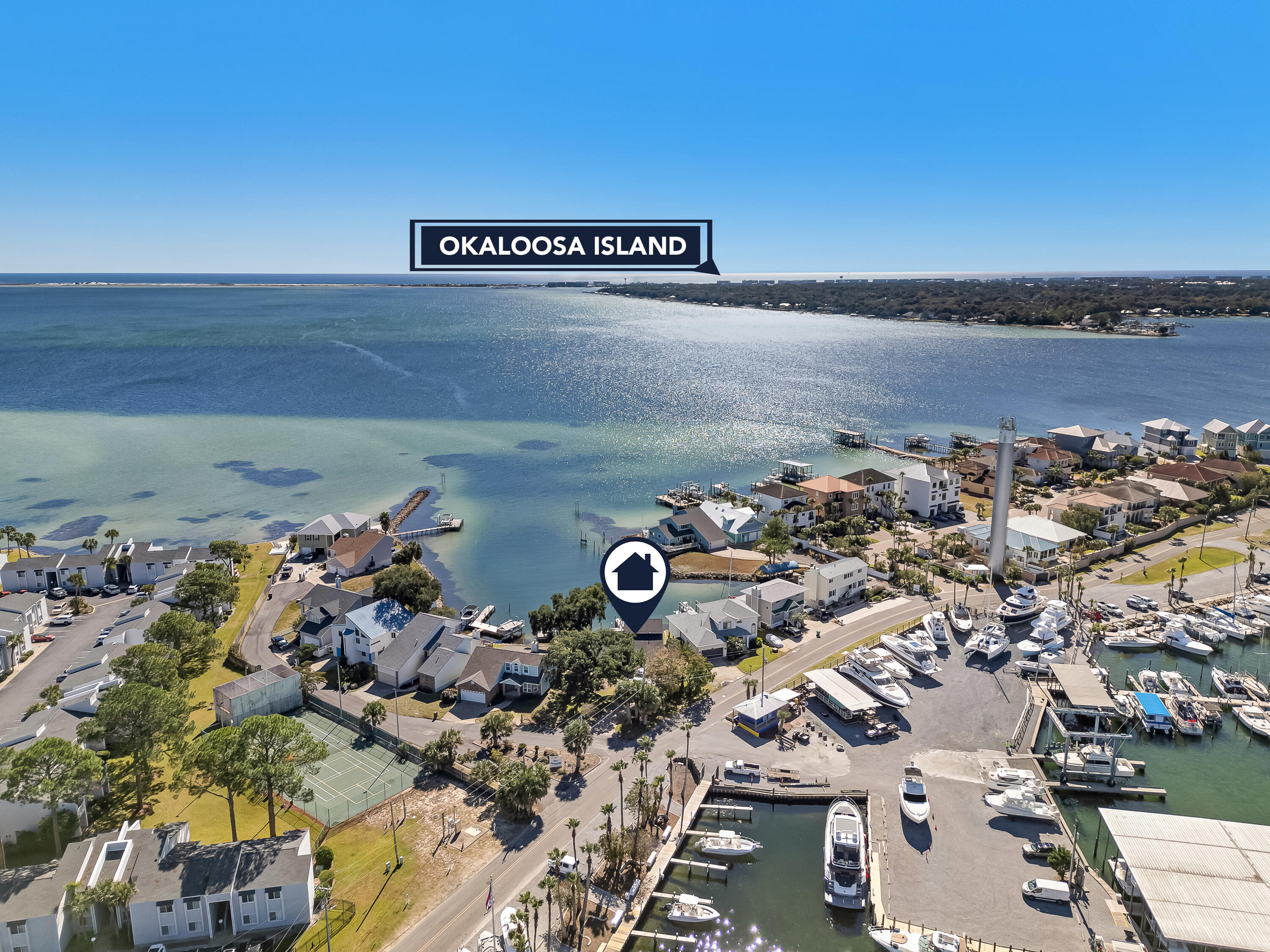 101 Port Drive Shalimar, FL 32579 - Photo 14 of 45 an aerial view of a water heater and a car parked on the road