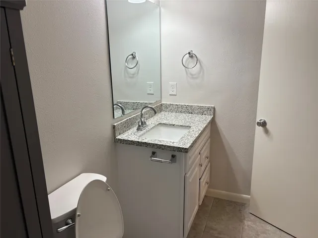 a view of backyard with green space