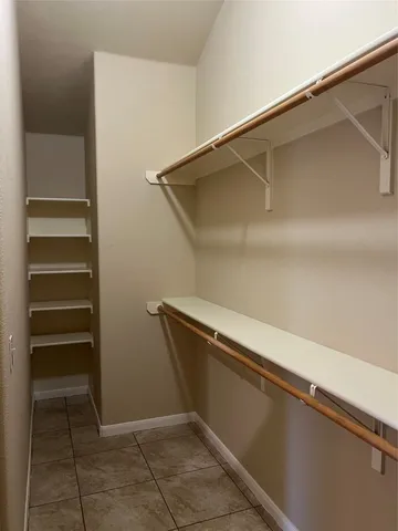 a bathroom with a glass door shower