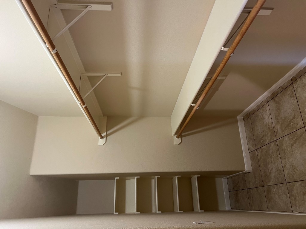 129 Holmstrom Street Hutto, TX 78634 - Photo 16 of 26 Spacious closet with light tile patterned flooring