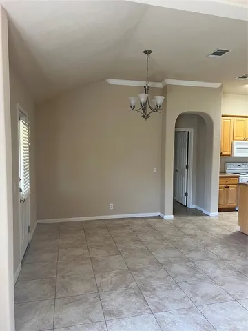 a view of a chandelier in a room