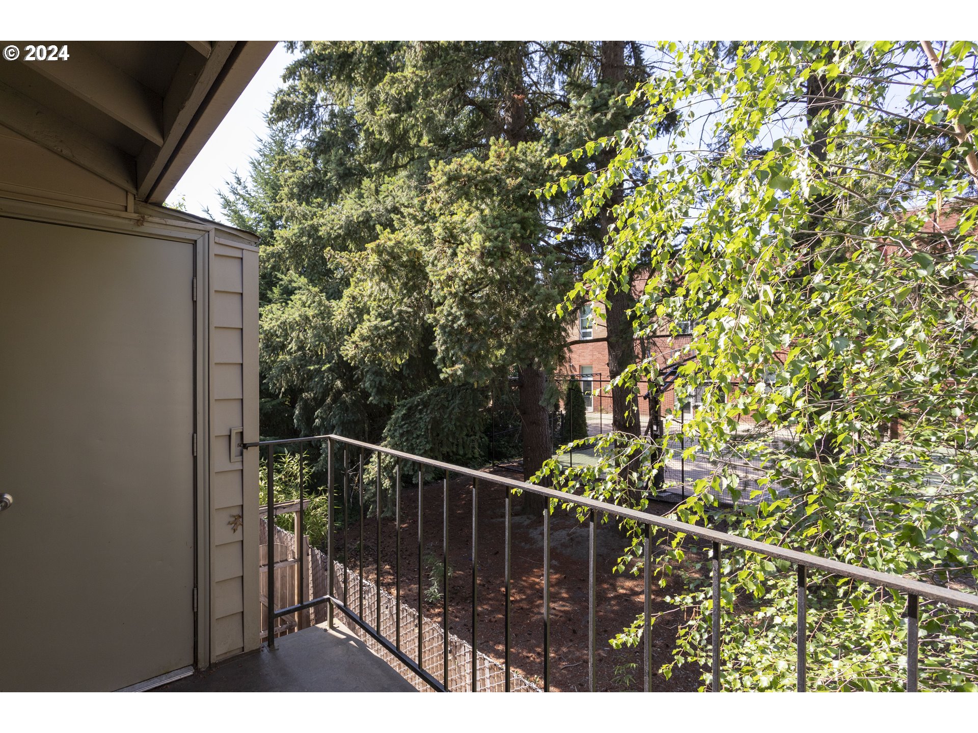 11377 Southwest Springwood Drive, Unit 34 Portland, OR 97223 - Photo 25 of 28 a view of a balcony