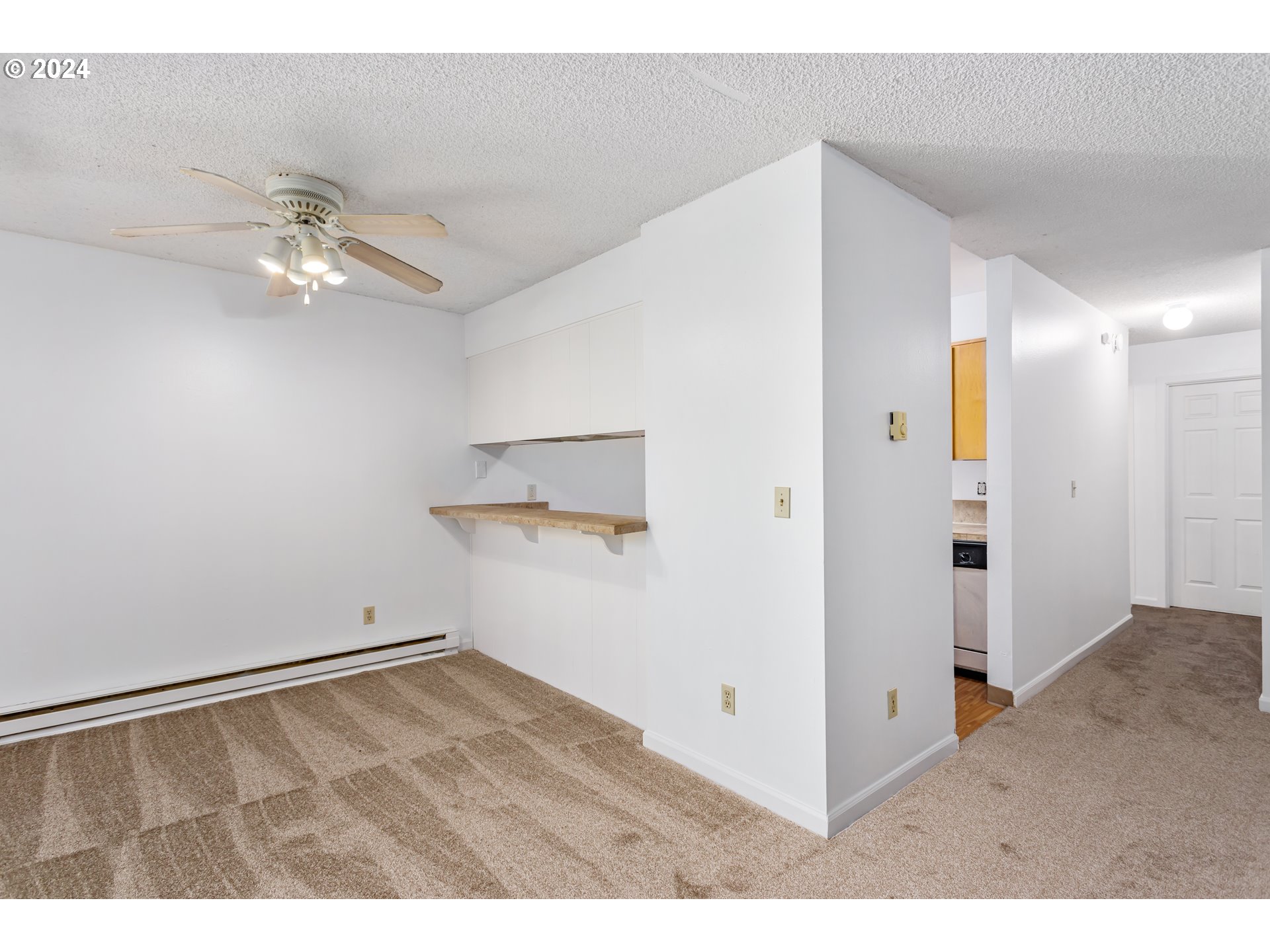 11377 Southwest Springwood Drive, Unit 34 Portland, OR 97223 - Photo 10 of 28 a view of an empty room