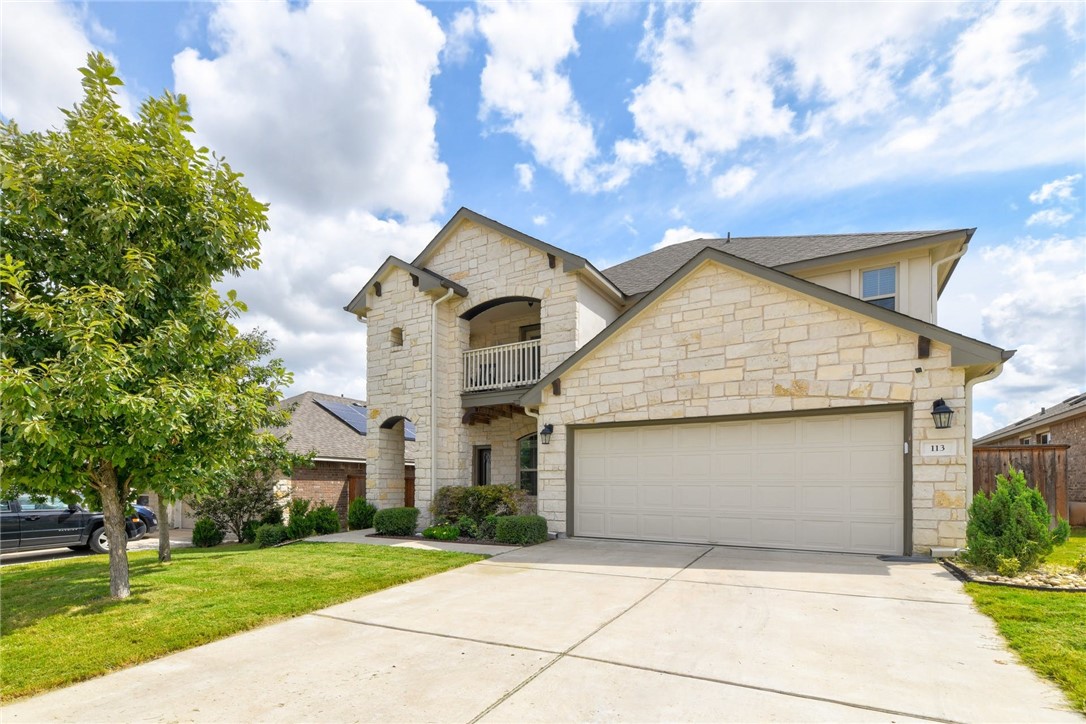 113 Checkerspot Court Georgetown, TX 78626 - Photo 1 of 1 The beautifully landscaped front yard and long driveway leading up to the 2-car garage of 113 Checkerspot Court!