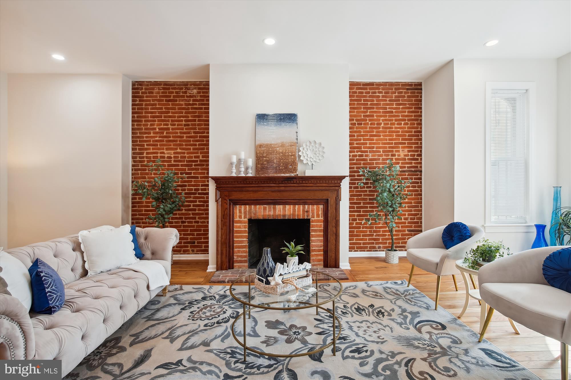 616 E Street Northeast Washington, DC 20002 - Photo 13 of 79 a living room with furniture and a fireplace