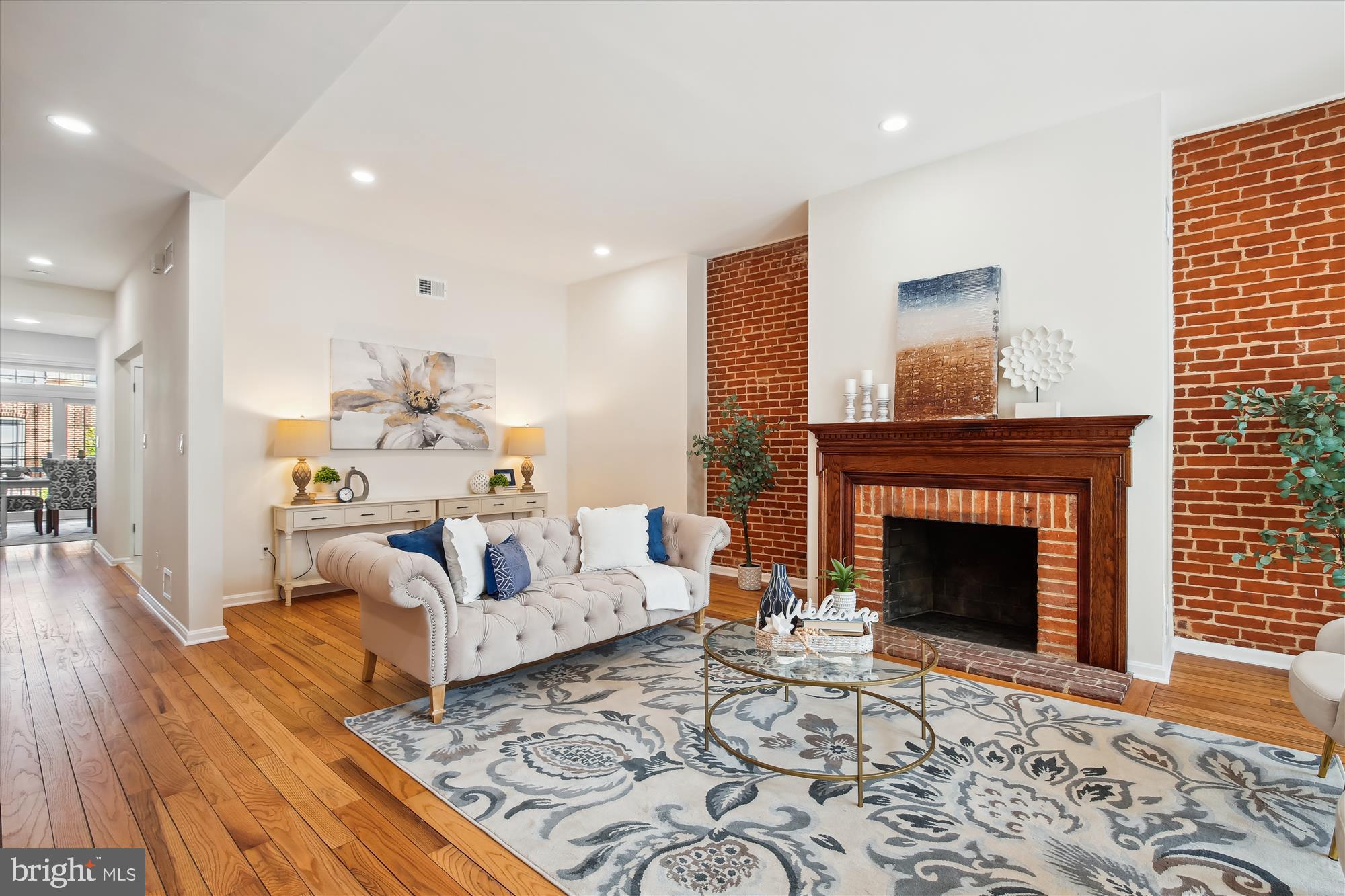 616 E Street Northeast Washington, DC 20002 - Photo 15 of 79 a living room with furniture and a fireplace