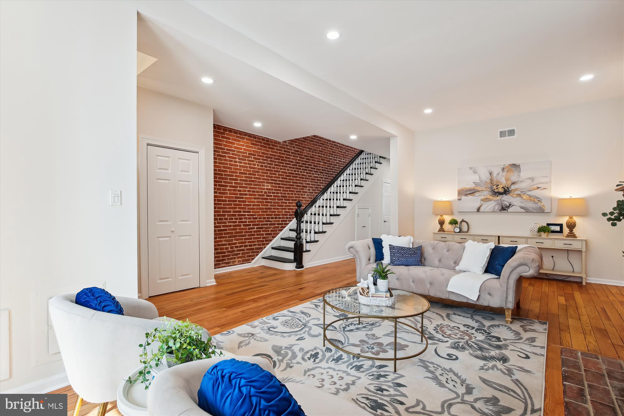 616 E Street Northeast Washington, DC 20002 - Photo 16 of 79 a living room with furniture and wooden floor