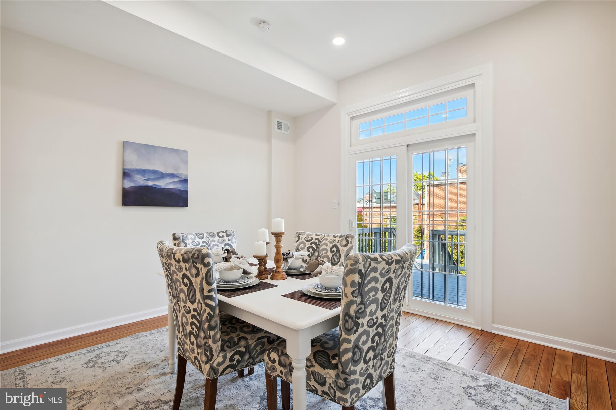 616 E Street Northeast Washington, DC 20002 - Photo 23 of 79 a view of a dining room with furniture and wooden floor