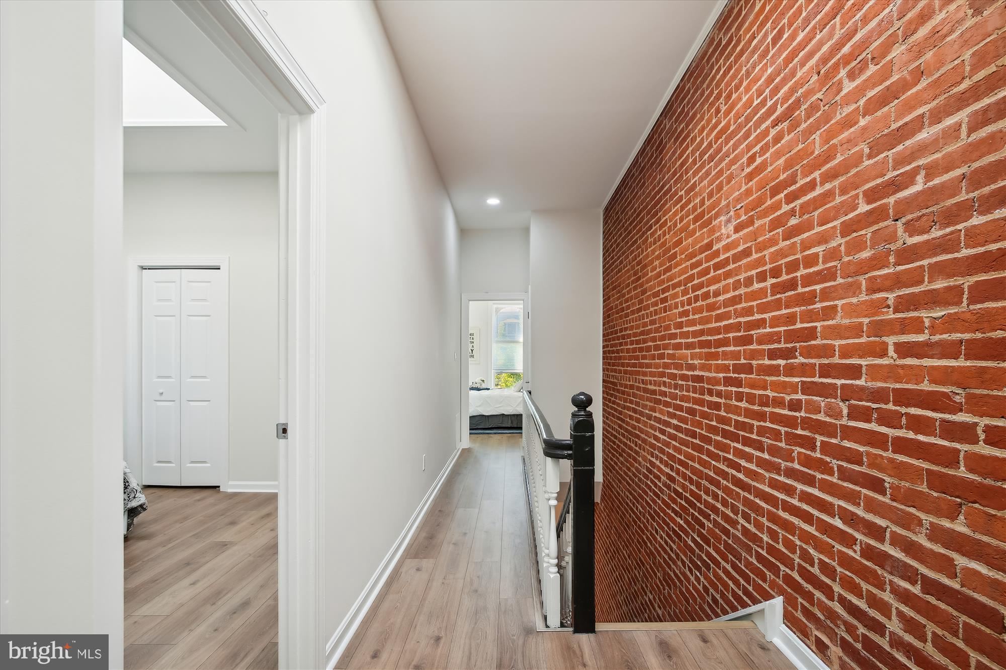 616 E Street Northeast Washington, DC 20002 - Photo 37 of 79 a view of a hallway with wooden floor and staircase