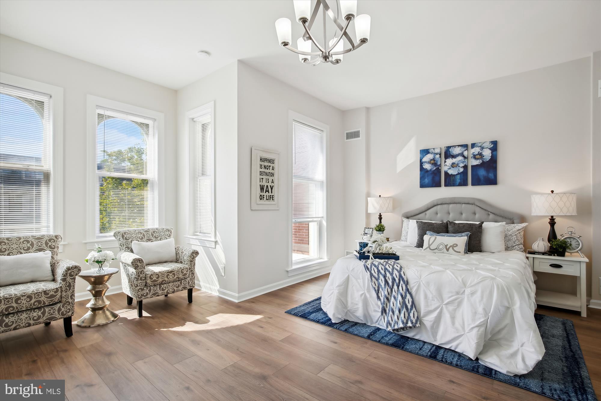 616 E Street Northeast Washington, DC 20002 - Photo 46 of 79 a bedroom with a bed and wooden floor