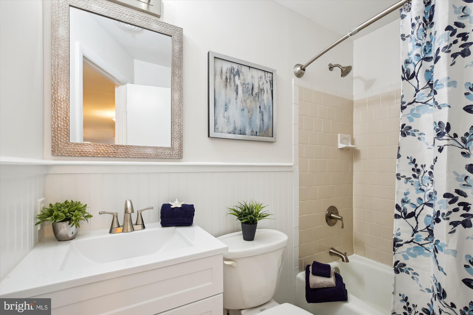 616 E Street Northeast Washington, DC 20002 - Photo 51 of 79 a bathroom with a sink a toilet and a bathtub