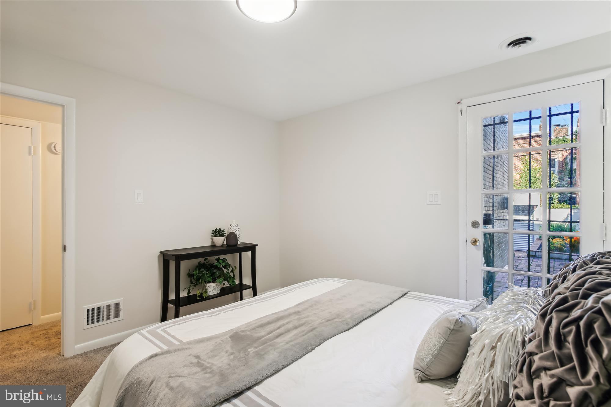 616 E Street Northeast Washington, DC 20002 - Photo 61 of 79 a bedroom with a bed and a window