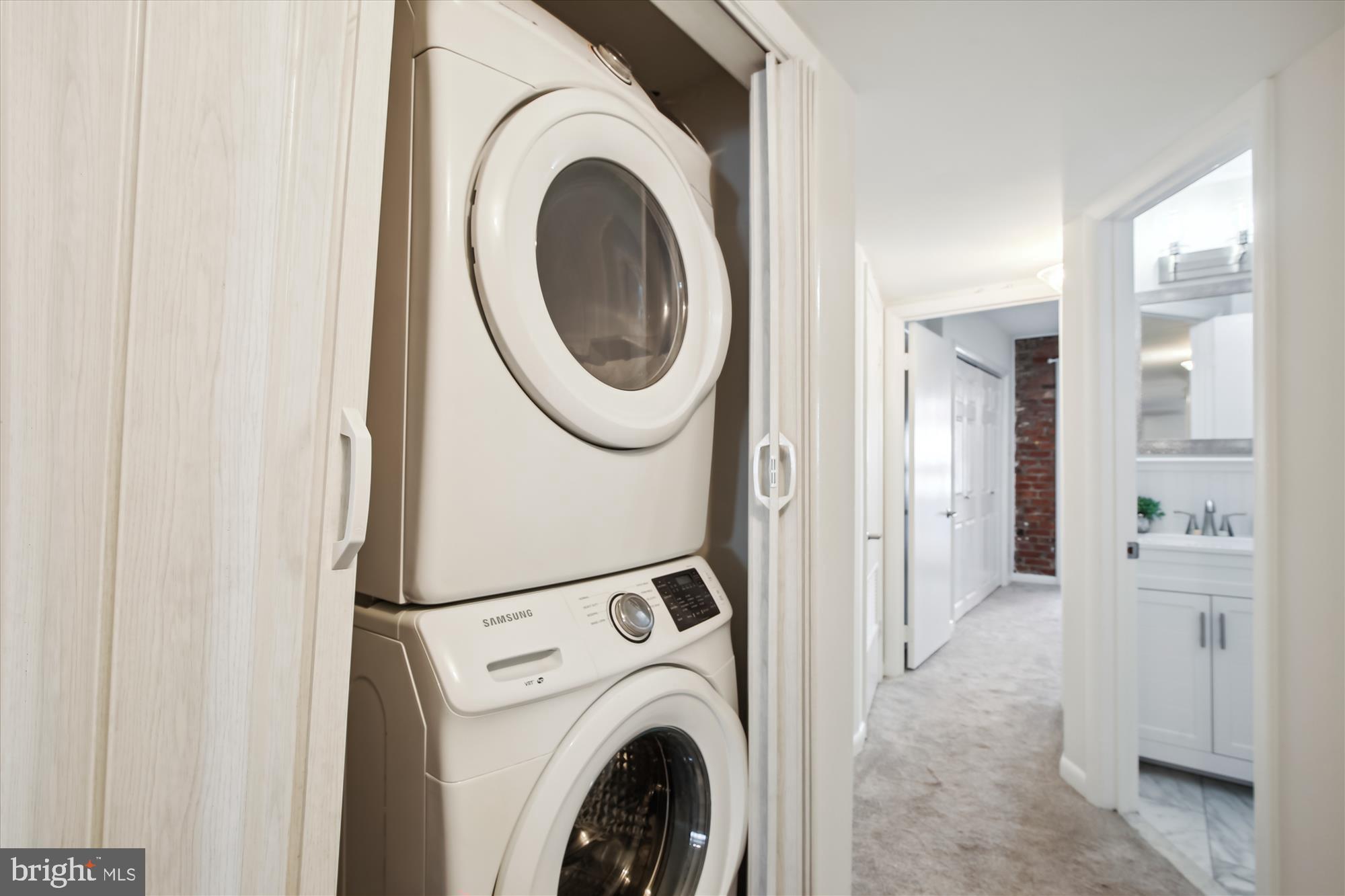 616 E Street Northeast Washington, DC 20002 - Photo 66 of 79 a view of a hallway with washer and dryer